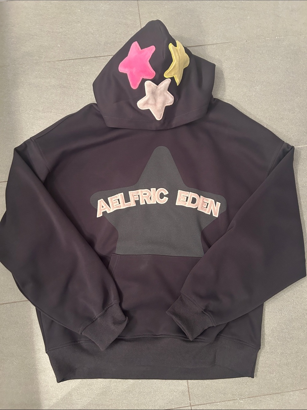 Aelfric Eden Black Hoodie with Rainbow Star Accents
